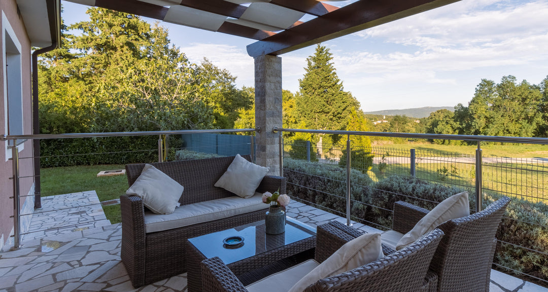 Outdoor patio rattan sofa with pillows