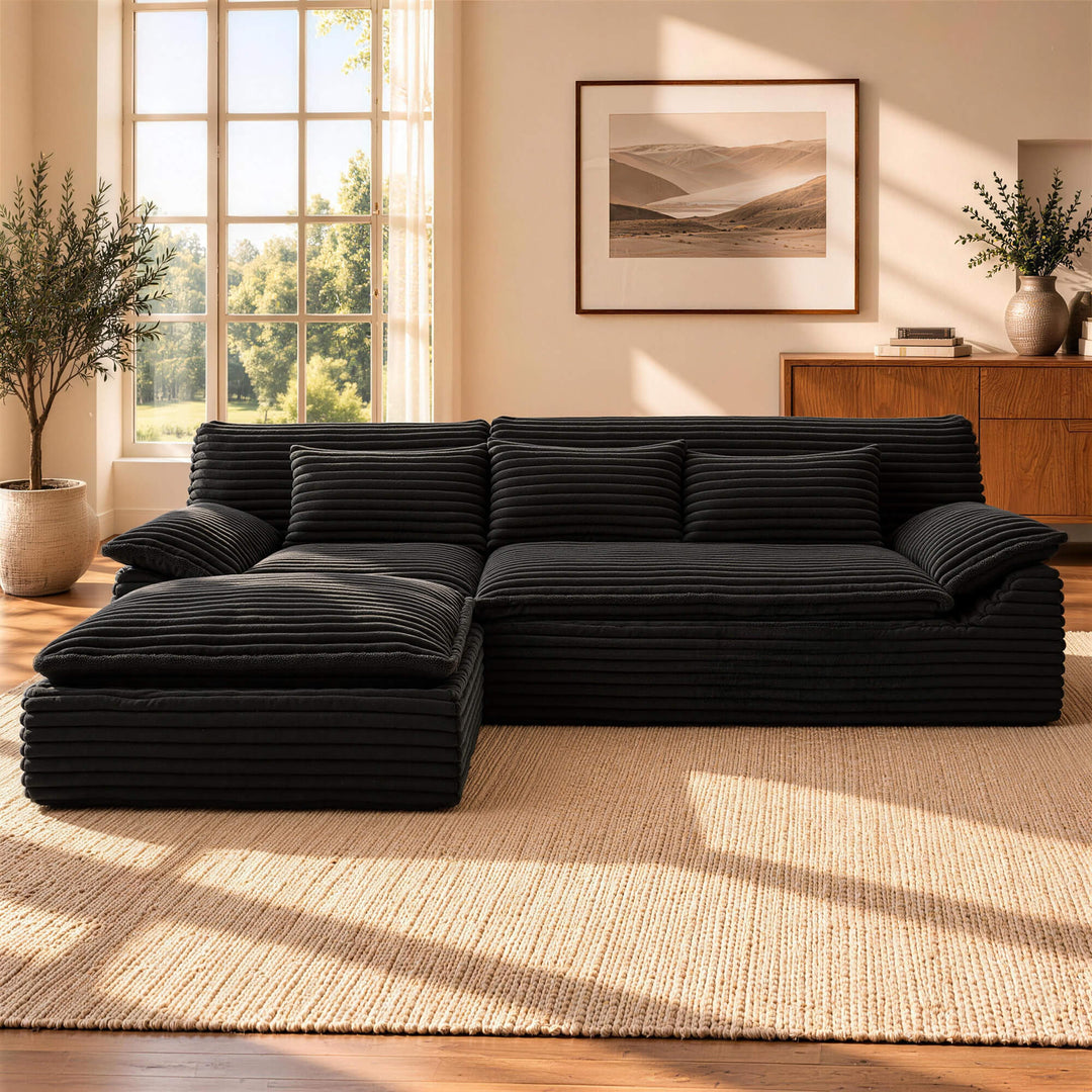 Black Pamapic Corduroy Boneless Cloud Sectional Sofa in a living room