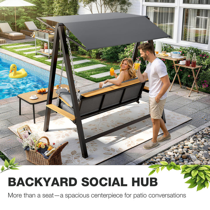 Pamapic Forge 3-seat patio swing with canopy beside an outdoor pool