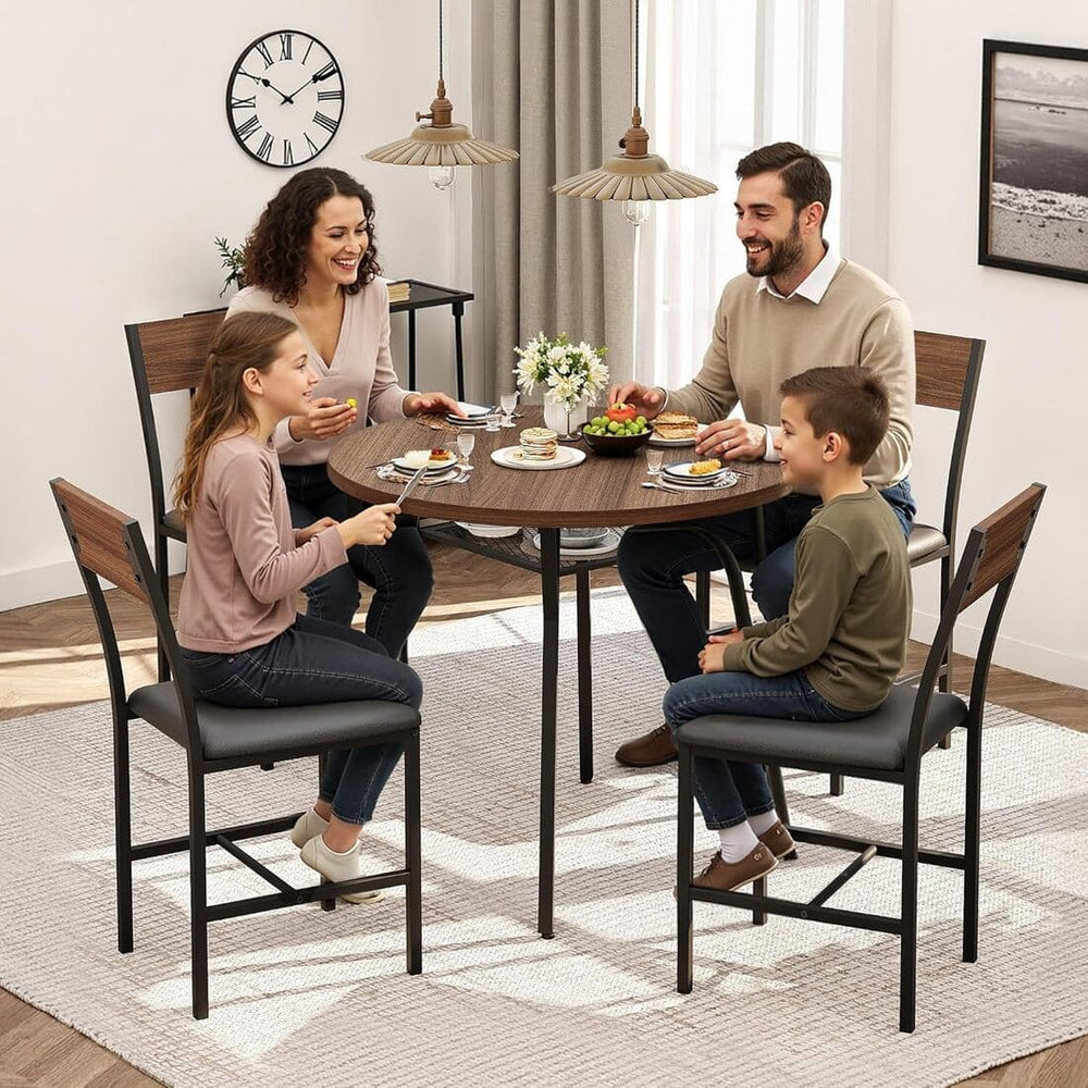 Family of four sitting around a round dining table in a well-lit room.